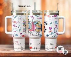 two travel mugs with the words nurse and medical symbols on them are sitting on a wooden table