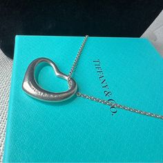 Pure Silver Is A Good Investment Just As Gold Is. Plus It Is Tiffany Tiffany & Co Large Elsa Peretti Open Heart Pendant In Solid .925 Silver . Shiny And In Very Good Condition Comes With Box Total Weight : 9.59 Grams Length : 20 Inches Brand New Price Est $1,000 + Luxury Platinum Jewelry For Valentine's Day, Timeless Silver Heart Jewelry, Designer Platinum Jewelry Gift, Luxury Silver Heart Necklace For Formal Occasions, Timeless Silver Jewelry For Valentine's Day, Silver Platinum Necklace Gift, Designer Platinum Jewelry For Gift, Silver Platinum Necklaces For Gifts, Silver Platinum Necklace For Gift