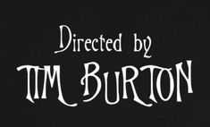 the title for directed by tim burton, written in white ink on a black background