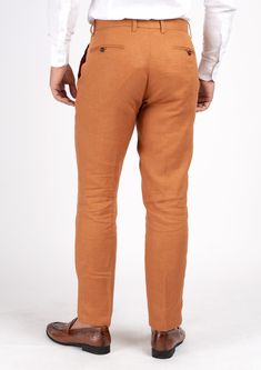 Add a stylish statement to your wardrobe with these unique burnt orange linen pants! Crafted with pure linen for a crisp, lightweight feel, this custom-made piece is sure to stand out. Make a fresh impression with these eye-catching custom made pants! Fitted Tapered Leg Summer Chinos, Fitted Straight Chinos For Summer, Fitted Linen Pants For Workwear, Fitted High-waisted Summer Chinos, Tailored Linen Long Pants, Fitted Brown Pants For Summer, Brown Fitted Pants For Summer, Summer Wide Leg Fitted Chinos, Fitted Linen Chinos Straight Pants