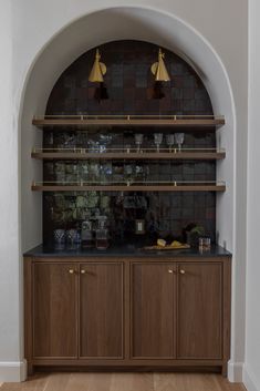 Custom dry bar with dark purple Zellige tile, with brass fixtures and hardware. Walnut cabinetry with reeded front detail. Wet Bar Backsplash Ideas White Cabinets, Small Bar Area With Sink, Fluted Curved Kitchen Island, Build In Bar Cabinet, Jean Stoffer Wet Bar, Modern Mediterranean Wet Bar, Closet Into Dry Bar, Kitchen Bar Station, Modern Spanish Backsplash