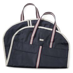 Sturdy and stylish, this garment bag has comfortable straps, external pockets and helps keep your show clothes wrinkle-free. 100% polyester Two large exterior pockets with magnetic closures Hanger opening and strap Full-length zipper Equestrian lining Comfortable web straps | Ariat Team Garment Bag in Blue Navy Nylon Bag With Pockets, Navy Boots, Wrinkled Clothes, Navy Bag, Best Luggage, Equestrian Outfits, Garment Bag, Llbean Backpack, Computer Bags