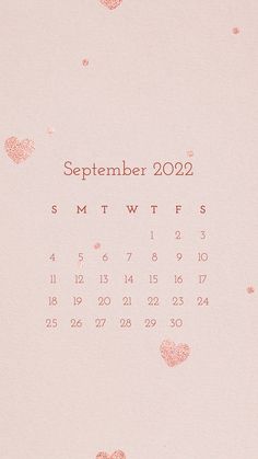 a pink calendar with hearts on it