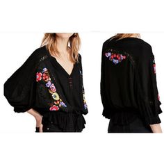 Stunning Free People Flowy Top Tags Off But Never Worn! Loose Fit And Sleeves With Floral Embroidery. It Has A Gathered Waist And Can Be Worn Regular Or Mid-Drift. Size Small - Has An Oversized Bohemian Fit. Black V-neck Blouse With Floral Embroidery, Black V-neck Tops With Floral Embroidery, Black Long Sleeve Embroidered Top For Summer, Black Long Sleeve Embroidered Top, Black Embroidered Long Sleeve Top For Summer, Black Embroidered Top For Spring, Casual Black Blouse With Floral Embroidery, Black Long Sleeve Tops With Floral Embroidery, Spring Black V-neck Embroidered Top