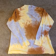 Nwt Free People Cotton Tie Dye Long-Sleeved Shirt With Mock Neck. Light Weight, 100% Cotton Perfect For Summer Evenings Or Transition To Fall. Colors Are Yellow, Light Purple And Rust/Orange. (Color On Tag Is "Lilac Woods") Slightly Oversized Fit. Size Small And Medium Available. S Smoke Free Home. Yellow Long Sleeve Tops For Fall, Yellow Long Sleeve T-shirt For Spring, Fall Yellow Cotton Tops, Yellow Relaxed Fit Long Sleeve T-shirt, Yellow Long Sleeve Tops For Spring, Yellow Cotton Tops For Fall, Casual Yellow Long Sleeve Shirt, Casual Long Sleeve Yellow Shirt, Fall Yellow Crew Neck Shirt