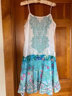 "I LOVE the colors in this Vintage Liz Claiborne slip dress. The top was a camisole before I sewed this sweet ruffled skirt on the bottom. The appliqué is also vintage (Circa early 1980's) and hand died to match the skirt. It is a size medium. Bust measures 40\" around. The waist is also 40\" around. The length is 37 inches from the armpit to the skirt bottom. There are also adjustable silk straps. This is a must have for spring and summer!" Spring Camisole Dress With Lace Trim, Beach Camisole Dress With Ruffles, Camisole Dress With Lace Trim For Spring, Spring Camisole Dress With Ruffles, Camisole Dress With Ruffles For Spring, Bohemian Spaghetti-strap Dress With Lace Patchwork, Bohemian Dress With Lace Patchwork And Spaghetti Straps, Bohemian Dresses With Attached Cancan For Spring, Summer Tiered Skirt Dress With Lace Patchwork