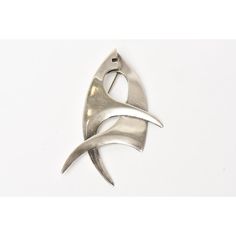 This is part of Chairish’s Costume Jewelry assortment.  This wonderful vintage hallmarked abstract sterling silver signed  brooch/ pin by Sigi Pineda Is hallmarked TB-28 Mexico 925. It is from the 60's. it is a formation of a fish. Mid-century Silver Jewelry With Brooch, Mid-century Silver Brooch For Collectors, Mid-century Silver Brooches For Collectors, Modern Silver Brooch Jewelry, Contemporary Silver Brooches For Formal Occasion, Modern Silver Jewelry Brooch, Modern Sterling Silver Brooch For Gift, Hallmark, Vintage Sterling Silver