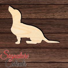 a wooden cutout of a dog sitting on top of a wooden floor with the words signature cuts