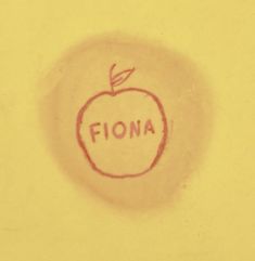 a drawing of an apple with the word fiona written in red on it