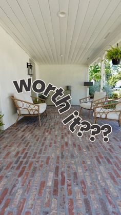 a brick patio with chairs and a sign that says wrong?