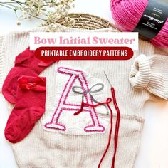 some knitting supplies are laying out on the table with text overlay that says bow initial sweater printable embroidery patterns