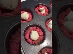 there are some cupcakes with white frosting in the middle and one is filled with red velvet