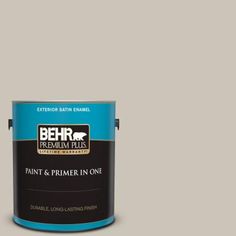 an orange paint can with the words behr premium plus painted on it's side