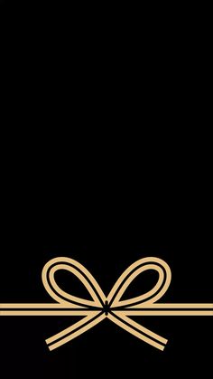 a black and gold background with a bow