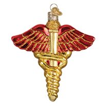 a gold medical cadus ornament hanging from a hook on a white background