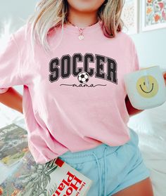 Soccer Mom Shirt, Sports Parent Shirt, Soccer Lover, Cute Soccer Shirt, Soccer Mom T-shirt, Mom Shirt, Soccer Mom Gift, Soccer Mom Tee 🌸Material: Crafted with 6.1 oz/yd² of premium 100% Ring Spun US cotton, ensuring superior quality and comfort. 🌸Fit: Features a relaxed fit that is both comfortable and stylish, suitable for all genders and sizes. 🌸Collar: Equipped with a topstitched, classic width, rib collar for a timeless and refined look. 🌸Sizing: Runs true to size, providing a consistent Sports Team Name Pink T-shirt, Pink Team Spirit Tops With Team Name, Pink Tops With Team Name For Team Spirit, Pink Crew Neck T-shirt For Sports Events, Pink Crew Neck Top For Sports Events, Pink Short Sleeve T-shirt For Sports Events, Sporty Pink T-shirt With Screen Print, Pink Team Spirit T-shirt With Short Sleeves, Pink T-shirt With Team Name For Sports Season