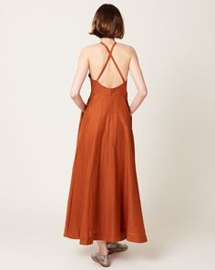 Argentina Dress in Rust | Cawley | Covet + Lou | Covet + Lou Cotton Maxi Dress With Tie Back For Casual Wear, Cotton Maxi Dress With Tie Back For Casual Occasions, Elegant Cotton Maxi Dress With Adjustable Straps, Summer Maxi Slip Dress With Back Opening, Chic Cotton Backless Maxi Dress, Linen Maxi Dress With Tie Back And Spaghetti Straps, Bias Cut Skirt, Japanese Cotton, Back Dress