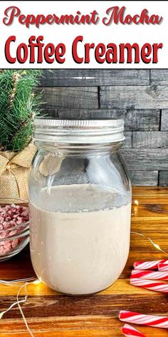 peppermint mocha coffee creamer in a glass jar with candy canes