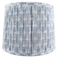 a blue and white pleated lamp shade