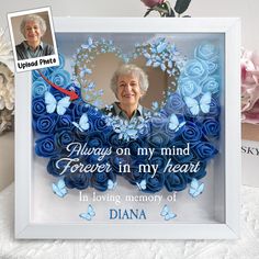 a photo frame with an elderly woman's face and blue roses in the background