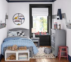 a child's bedroom with toys and decor