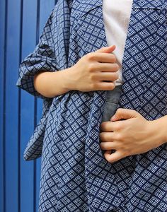 Vintage kimono jacket in blue with a pale blue geometric print. Box sleeves. Fully lined. No fastenings. One size, suitable UK size 6-18 (Eur 34-46). Measurements - 46"(117cm) bust - 12.5"(32cm) sleeve length - 54"(138cm) length. Material - Mixed. Condition - Excellent. Handpicked, repaired and ready to wear. This is an original vintage item, not new and minor signs of wear & age are expected, we will highlight any major flaws. Model is a UK 6/8 and is 5'7" tall. Blue Outerwear With Kimono Sleeves For Spring, Blue Cotton Outerwear With Kimono Sleeves, Casual Blue Long Sleeve Kimono, Blue Long Sleeve Cotton Kimono, Blue Cotton Long Sleeve Kimono, Summer Indigo Long Sleeve Kimono, Vintage Kimono Jacket, Short Kimono Jacket, Luxury Blue V-neck Kimono