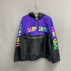 1980s Surf Style Iridescent Windbreaker Pullover Purple One Size Hooded Beach Jacket Some graphic cracking overall amazing vintage condition Pit to Pit: 25in Top Collar to Bottom: 27in Sleeve Length: 36in 90s Multicolor Hooded Outerwear, Retro Multicolor Windbreaker For Streetwear, Retro Purple Windbreaker For Streetwear, Multicolor Hooded Windbreaker For Streetwear, 90s Hooded Windbreaker For Streetwear, Hooded Multicolor Windbreaker For Streetwear, Urban Multicolor Windbreaker For Streetwear, Purple Hooded Windbreaker For Streetwear, Vintage Purple Windbreaker For Streetwear