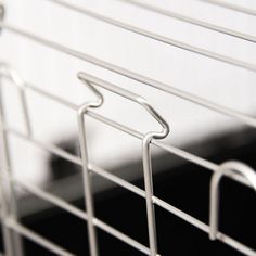 a close up view of a metal wire basket