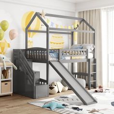 a child's bedroom with a bunk bed and slide