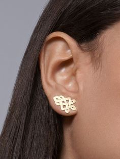 This is a unique pair of stud earrings, which are in the shape of an arrow head with celtic designs. They are edgy and impressive on the ears. They are made of yellow gold plated silver and have a nice matte finish. They are held firmly to the ear by silver+silicone ear backings. Their size is 1.2 \ 0.5 inch ( 2.1 \ 1.2 cm ) These earrings are made to order and take 2- 3 weeks to make. To see these earrings in gold plated silver, click here: https://www.etsy.com/listing/227517754/gold-plated-cel Gold Plated Yellow Gold Ear Climbers As Gift, Yellow Gold Plated Ear Climbers As Gift, Gold Plated Yellow Gold Ear Climbers For Gift, Yellow Gold-plated Ear Climbers As Gift, Gold Pierced Ear Climbers For Anniversary, Gold Ear Climbers With Matching Earrings For Anniversary, Gold Sterling Silver Ear Climbers For Wedding, Gold Ear Climbers For Anniversary, 14k Gold Ear Climbers As Gift