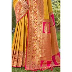 Mustard colored saree is made from kanjivaram silkfabric which is highlighted with beautiful weaving and tassels border as shown. comes along unstitched kanjivaram silk blouse piece which you can customise as per your design/style. Occasion - You can wear this saree for festivals, functions and ideal for any fashionista. Note:- the actual product may differ slightly in color and design from the one illustrated in the images when compared with computer or mobile screen. Measurements: Saree : KanjiVaram : 5.5 Mtrs Blouse : KanjiVaram Silk : 0.8 Mtr Material: KanjiVaram Silk Stitch Type: Unstitched Country of Origin: India Care Guide: Dry Clean Blouse Kanjivaram, Saree Kanjivaram, Kanjivaram Silk Saree, Mobile Screen, Blouse Piece, Surprise Gifts, Design Style, Silk Blouse, Silk Saree