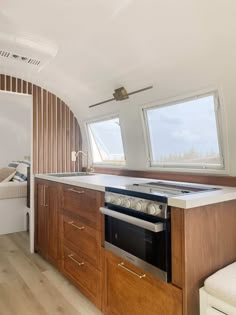 the kitchen is clean and ready to be used as a living room or dining area