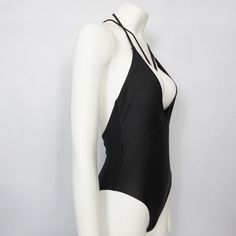 Material: Lycra, Nylon, SpandexWith Pad: No High Stretch Leotard For Beach, Solid High-stretch Beach Leotard, High Stretch Solid Leotard For Beach, High Stretch Solid Color Leotard For Beach, Stretch Backless Bodysuit For Poolside, Backless Stretch Leotard For Poolside, Backless Stretch Bodysuit For Swimming, High Stretch Elastane Bodysuit For Beach, Black Stretch Backless Leotard