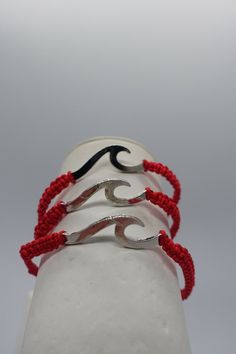 x12  Adjustable knot kabbalah wave cord red Bracelet wave amulet 11inch excellent quality cord red bracelet, with a metal wave, nice for gift and give luck  Measure: 11 inch L  Weight: 1 gram Red Bracelet, Adjustable Knot, Red Bracelets, A Metal, Bracelets And Charms, Fashion Watches, Knot, Jewelry Watches, Jewelry Bracelets