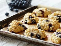 blueberry oatmeal cookies are on a baking sheet, ready to be baked