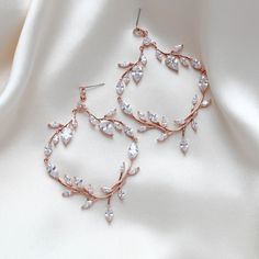 Large rose gold statement wedding earrings - APRILLE Glamorous Rose Gold Crystal Earrings With Cubic Zirconia, Glamorous Rose Gold Cubic Zirconia Crystal Earrings, Elegant Rose Gold Chandelier Earrings With Cubic Zirconia, Elegant Rose Gold Hoop Earrings For Party, Glamorous Sparkling Hoop Earrings For Wedding, Elegant Rose Gold Chandelier Earrings For Party, Glamorous Rose Gold Cubic Zirconia Bridal Earrings, Elegant Sparkling Rose Gold Earrings, Elegant Rose Gold Crystal Earrings With Cubic Zirconia