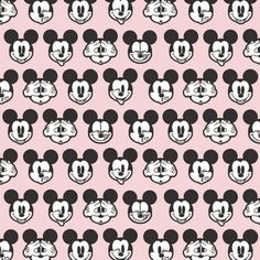 mickey mouse heads on pink background with black and white outlines in the shape of faces