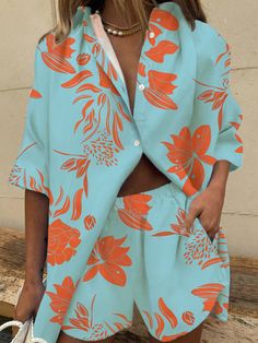 SkuCY-!170180Material95% Polyester , 5%Spandex StyleLoose , Wide Leg , Three-quarter Sleeves FeaturePockets , Leaves Print , Buttoned , Elasticity NecklineLapel OccasionCasual , Vacation SeasonsSpring , Summer TypeTwo Pieces Set ColorBLUE,ORANGESizeS,M,L,XL,2XL The fabric of the clothes looks a bit sheer. Please consult the size chart we provide for this item's measurements to help you decide which size to buy.Please note: There may be 1-3cm differ due to manual measurement.CMINCHBlouses TopsBustSleeveTop LengthS1102174M1142275L1182376XL12224772XL1262578CMINCHShorts BottomWaistBottom LengthS6035M6436L6837XL72382XL7639 Matching Shirt Short Set, Shorts Set Two Piece, Two Piece Shorts Set, Women Suits, Trendy Pants, Womens Suits, Pant Suits, Short Sleeve Shirt Women, Legging Sport