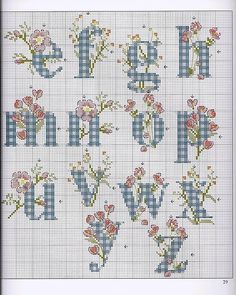 cross stitch alphabet with flowers and letters