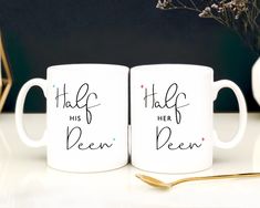 two white coffee mugs with the words half his and her been written on them