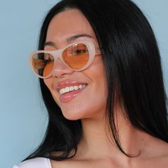 Style icon of the decade, Bella Hadid, has approved. You too can wear the same frame as the queen. You’ll serve looks while saving Mother Earth in our very first sustainable collection, made with a biodegradable bioacetate frame and polarized lenses. These lightweight sustainable bio-acetate peach aviator sunglasses will be sure to spread high quality vibes wherever you go. Designed in Brooklyn and worn everywhere. This style is unisex. 100% sun protection. Saving the planet one pair of sunnies Vintage Sunglasses With Uv Protection, Retro Pink Sunglasses For Spring, Vintage Cat Eye Sunglasses With Mirrored Lenses For Spring, Retro Pink Cat Eye Sunglasses With Tinted Lenses, Vintage Cat Eye Sunglasses With Uva Protection For Summer, Retro Everyday Sunglasses With Tinted Lenses, Retro Sunglasses With Tinted Lenses For Everyday, Vintage Cat Eye Sunglasses With Tinted Lenses For Summer, Retro Tinted Sunglasses For Spring