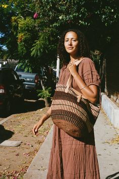 DIMENSION Each bag is unique, size varies COLOR Multi color MATERIAL Natural sisal fiber, leather strap Chic Brown Natural Fiber Bag, Bohemian Brown Basket Bag, Brown Handwoven Natural Fiber Bag, Sisal Bags, Chic Basket-shaped Shoulder Bag In Natural Fiber, Eco-friendly Beach Bag With Woven Leather And Natural Fiber, Sisal Basket, Basket Bags, Everyday Purse