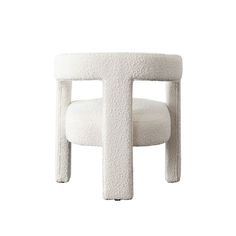 a white chair that is made out of sheep's wool and has a rounded seat