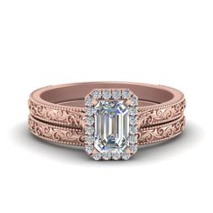 an antique style diamond engagement ring set in rose gold