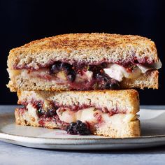 a grilled cheese and berry sandwich on a plate