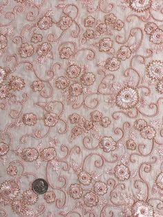 Distinguished by its luxurious design, this high-quality Pink Sequin & Beads On Silk Chiffon JEC-030-2 Fabric is perfect for women's high-end evening dresses, costumes, jackets, and skirts. Our unique and distinctive fabric is available in a wide selection of colors. The fabric is sold by the Yard, and measures 44 inches in width. Elegant Embellished Embroidered Fabric, Elegant Embellished Embroidered Fabric For Festive Season, Festive Elegant Organza Embroidered Fabric, Elegant Festive Pearl Embroidered Fabric, Elegant Fitted Embroidered Fabric For Festive Occasions, Fitted Elegant Organza Embroidered Fabric, Elegant Embroidered Fabric, Elegant Pink Embroidered Fabric For Festive Occasions, Festive Formal Embroidered Fabric With Sequins