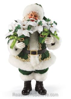 a santa clause figurine holding flowers in his hands