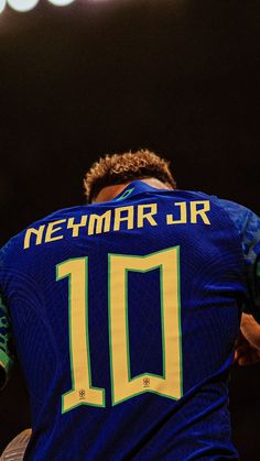 the back of a soccer player's blue jersey