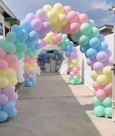 a bunch of balloons that are on the ground