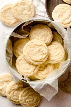 a bowl filled with cookies on top of a table